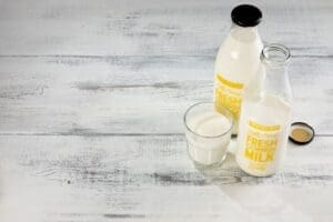 Self Serve Milk bottles with glass of milk