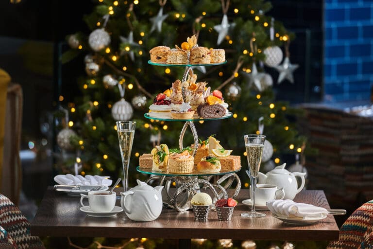 Afternoon Tea In Front Of Christmas Tree